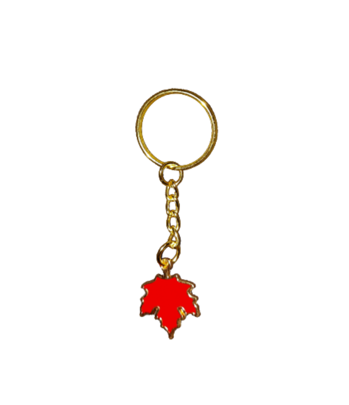 Gold keychain with red maple leaf pendant