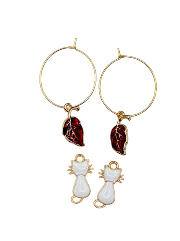 Red leaf and white cat pendants