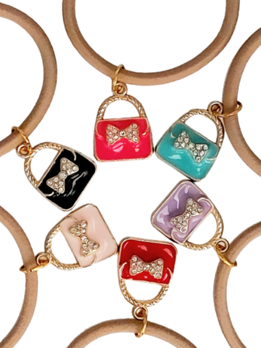 Close up - purse bottle charms